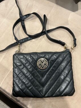 Quilted Black Crossbody with Gold Medallion Accent